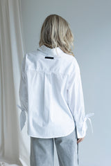 Pure cuff tie blouse