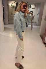 Distressed denim jacket