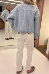 Distressed denim jacket