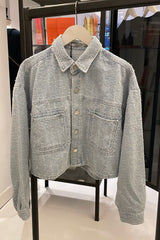 Distressed denim jacket