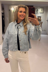 Distressed denim jacket