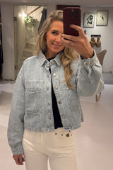 Distressed denim jacket